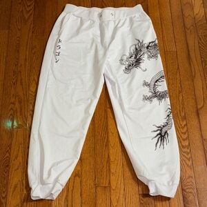 White Joggers with Black Dragon Graphic